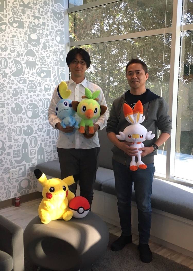 Shigeru Ohmori and Junichi Masuda stand in Nintendo’s Bay Area office