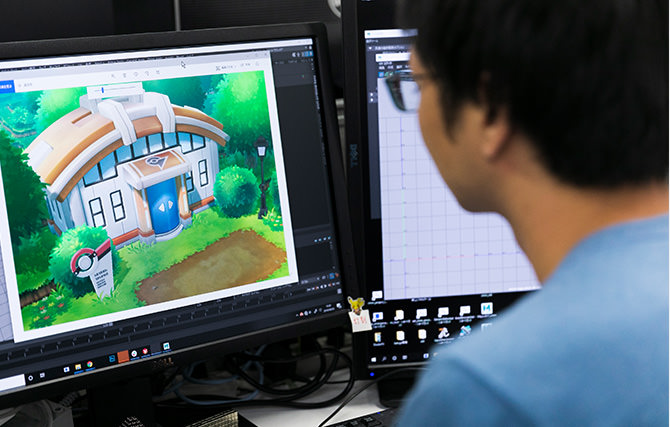 K.N. 在多屏工作站前雕琢3D场景几何体与环境光影细节
